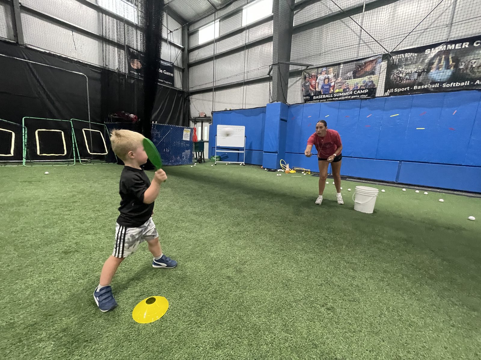Athletes training on the turf at the Frozen Ropes National Training Center